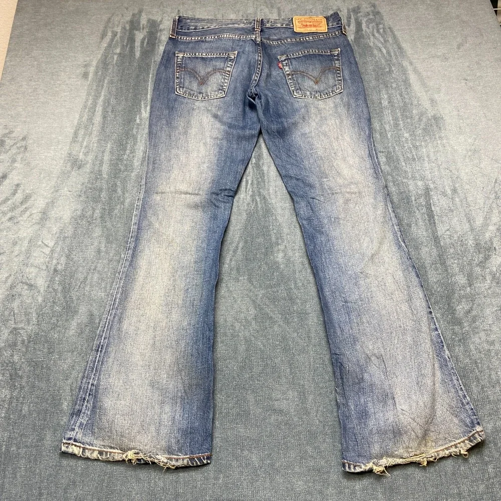 Vintage Levi's 569 Jeans Women 03 30x32 Blue Denim Medium Wash Flare Leg Raw Hem